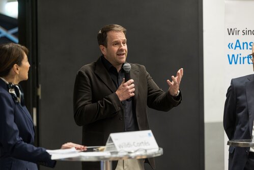 Volles Haus im flexA2 - wenn mit der AWG Wirtschaft und Politik zusammenkommen.